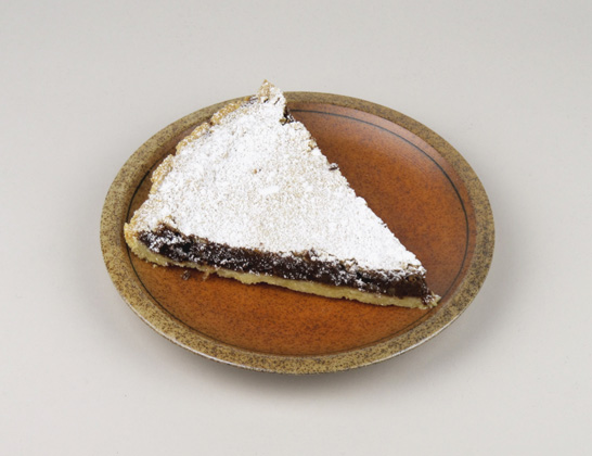 Stück Walnuss-Schokoladen-Tarte